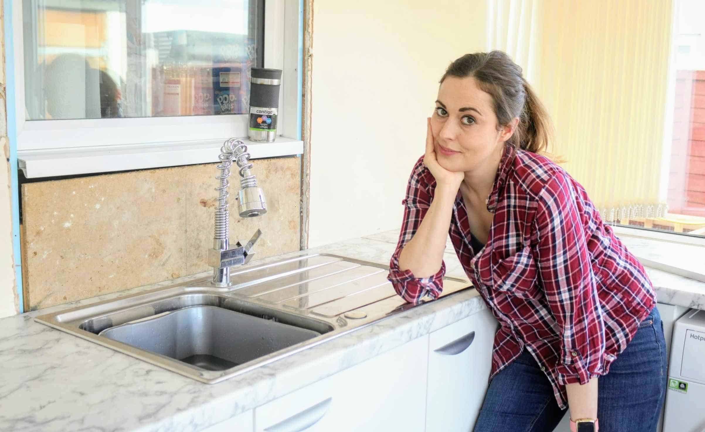 Why Does My Kitchen Sink Smell? [Causes+Solutions] Explained